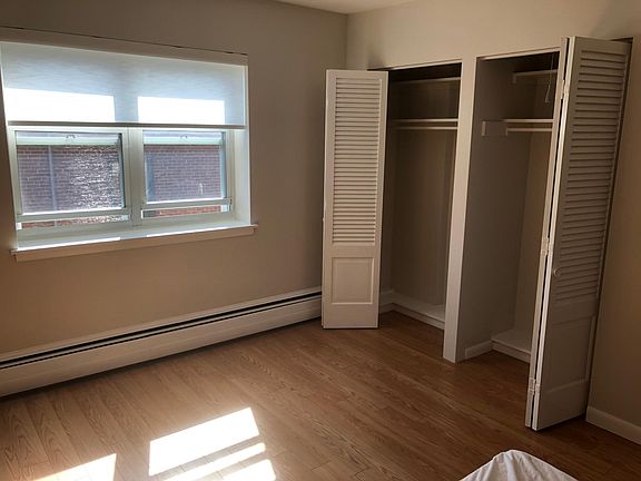 Bedroom closets (2 visible, 4 total in room)