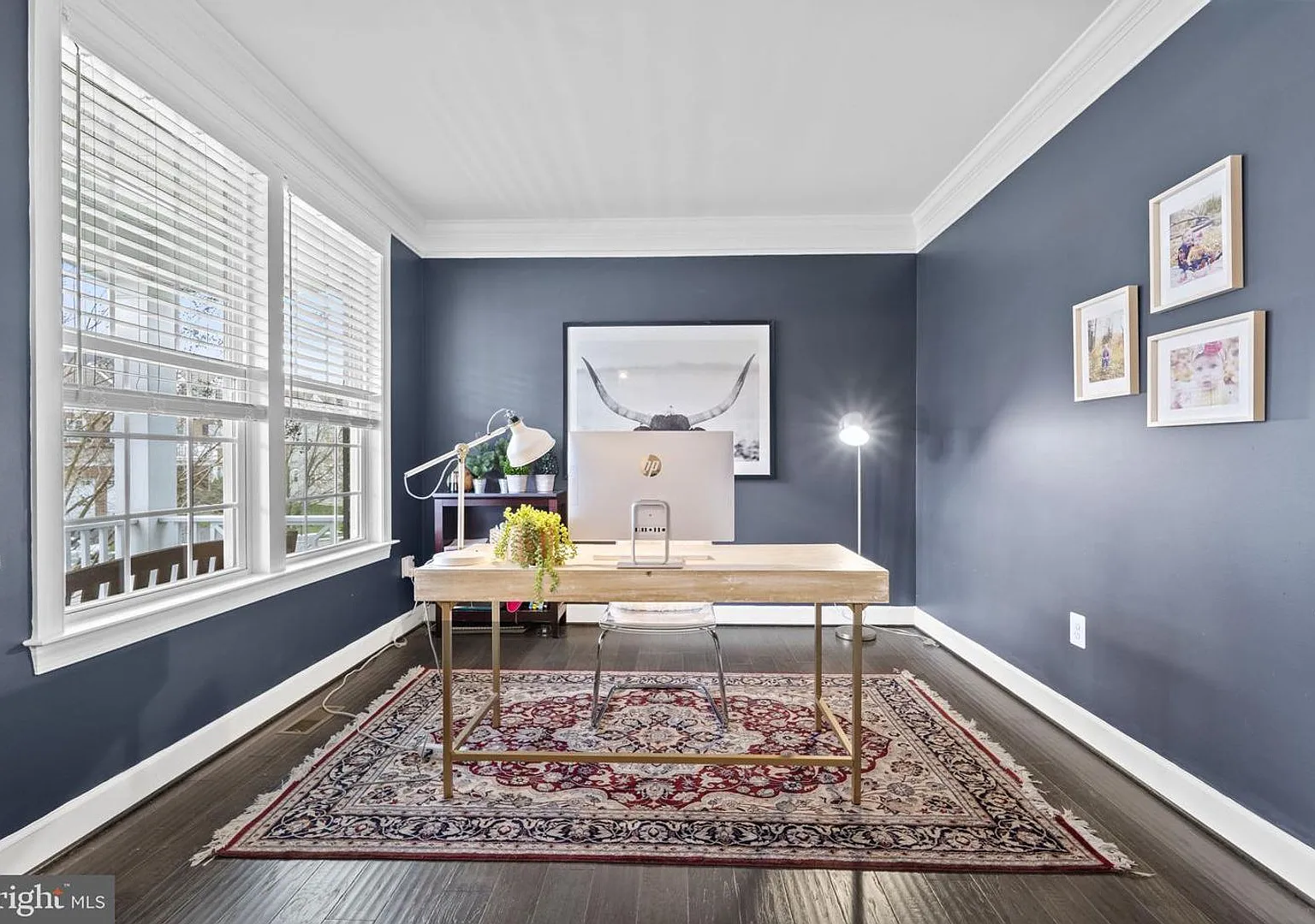 This beautifully maintained single-family home offers five bedrooms, four-and-a-half bathrooms, a... — Photo 4
