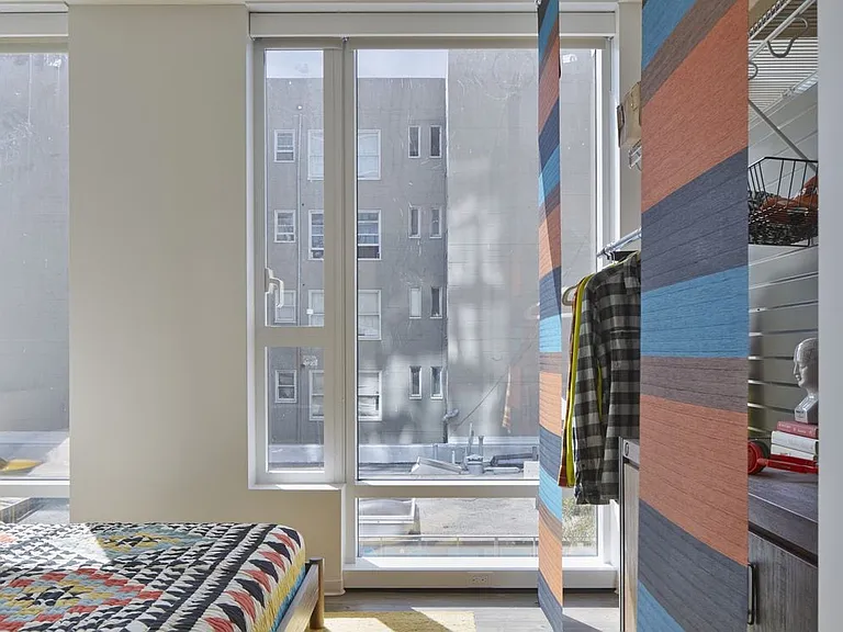 Bedroom with hard surface flooring