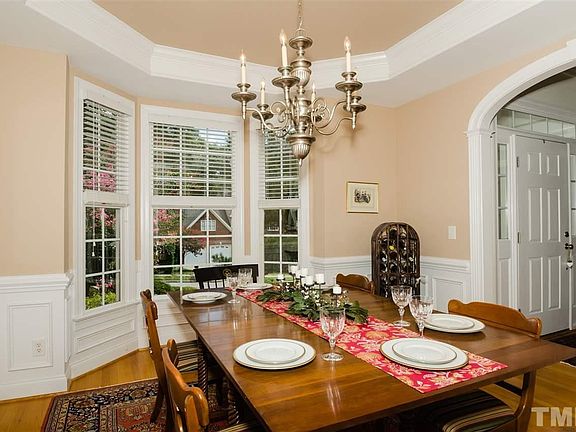 With Beautiful chandelier and arched doorways, you'll be proud to entertain in this lovely room!