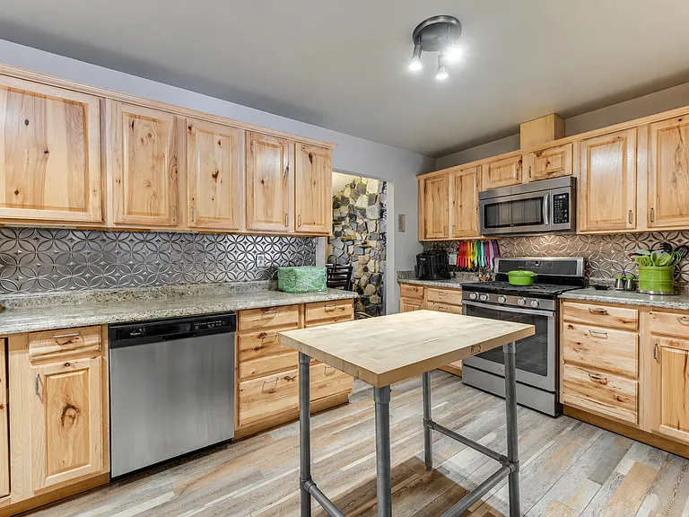 Full kitchen, stocked with all cooking equipment, utensils, air fryer, coffee pot, Keurig, toaster, slow cooker, and more.