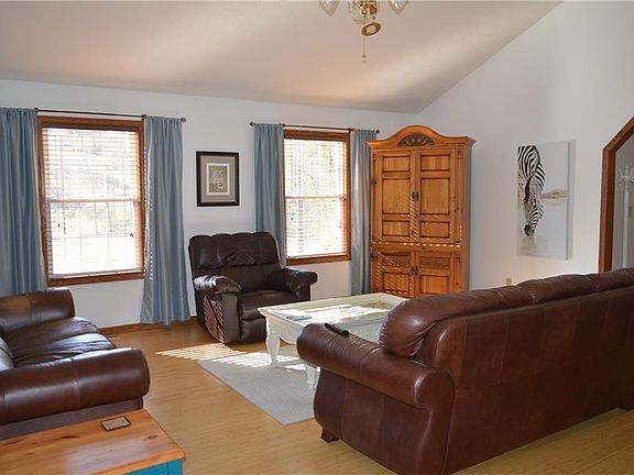 Spacious Living Room with Vaulted Ceiling.