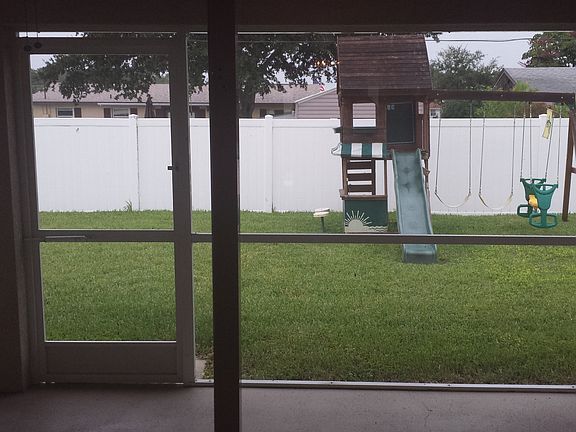 Fenced back yard for pool