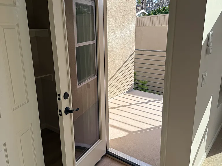 Door to front balcony