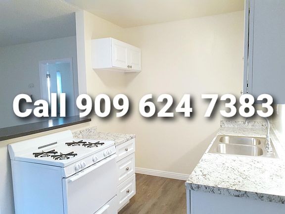*Brand new lovely white Gas range to make your inner chef happy.... *Modern marble-look countertop throughout the kitchen....