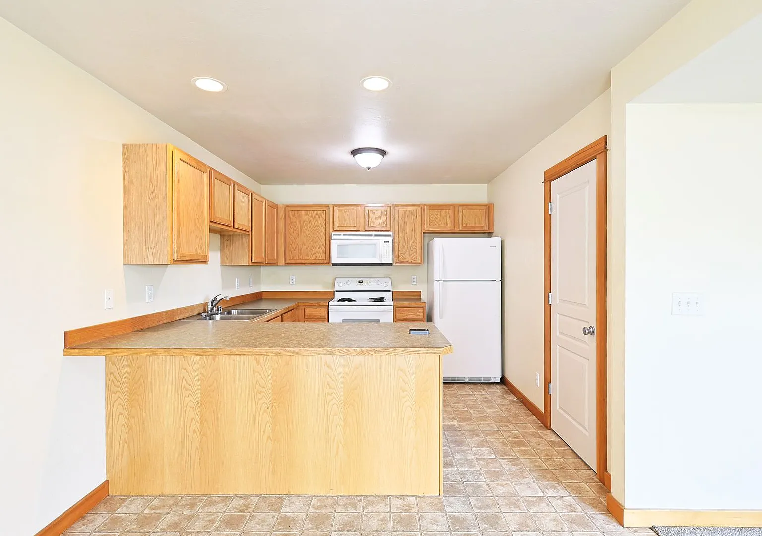 Refined Townhome with Gorgeous Landscaping and Private Space — Photo 4