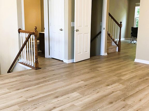 first floor, entry to living room and dinning area, newly renovated floor through main floor and 1st floor