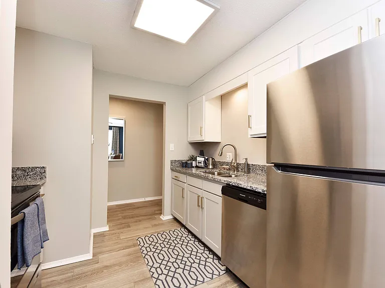 Kitchen with granite counters and stainless appliances