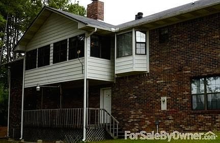Rear View
						:
						Sunroom overlooking back yard.