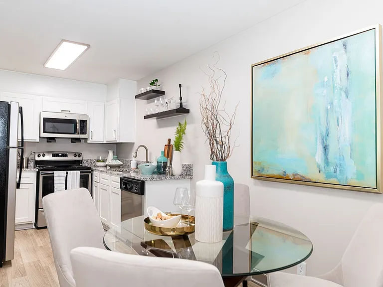 Dining area with hardwood-style flooring
