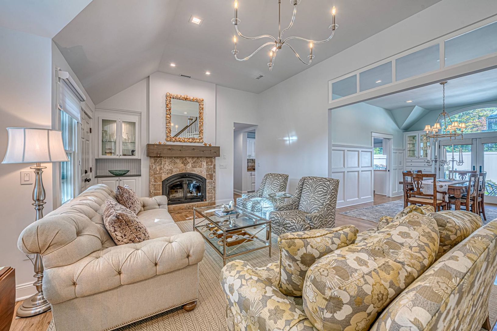  Living room with vaulted ceiling and fireplace