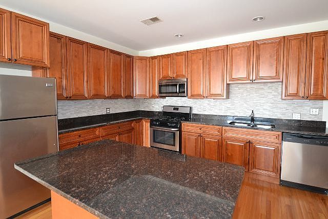 1st image of 914 W Belmont Ave #Three