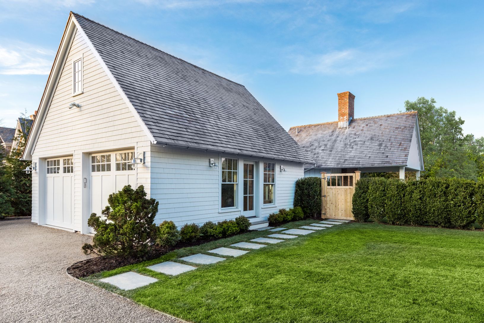  Garage and Poolhouse separated by hedge