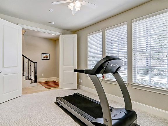 FIRST FLOOR BEDROOM HAS FRENCH DOORS. GREAT FOR STUDY OR DEN TOO! NEW CARPET