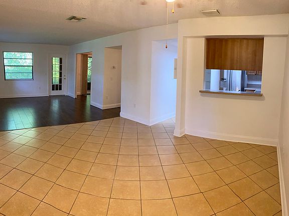 The spacious dining and living room are recently painted and offer lots of room for the family to enjoy time together.