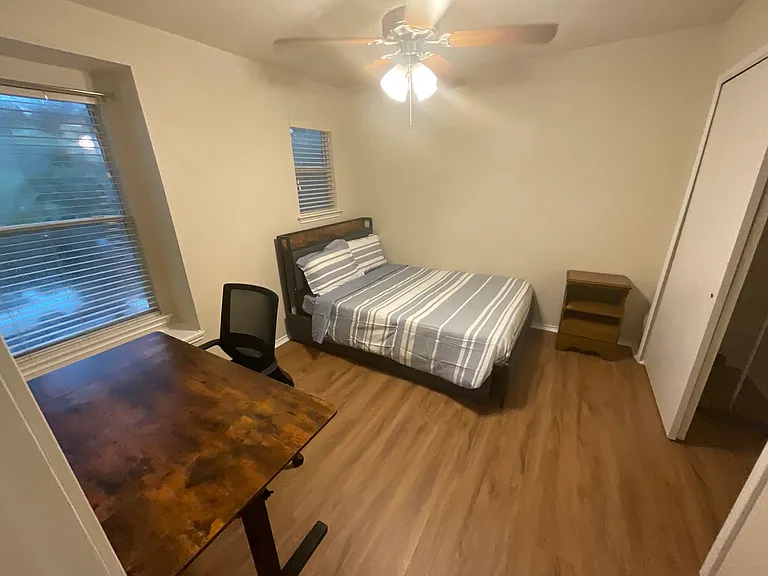 Ergonomic electric height adjustable standing or sitting computer desk. Head board also equipped with USB-C/plug-ins.