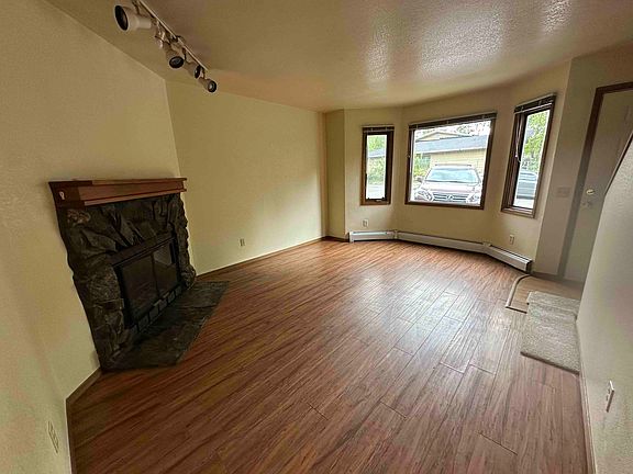 Family room with wood burning fire place