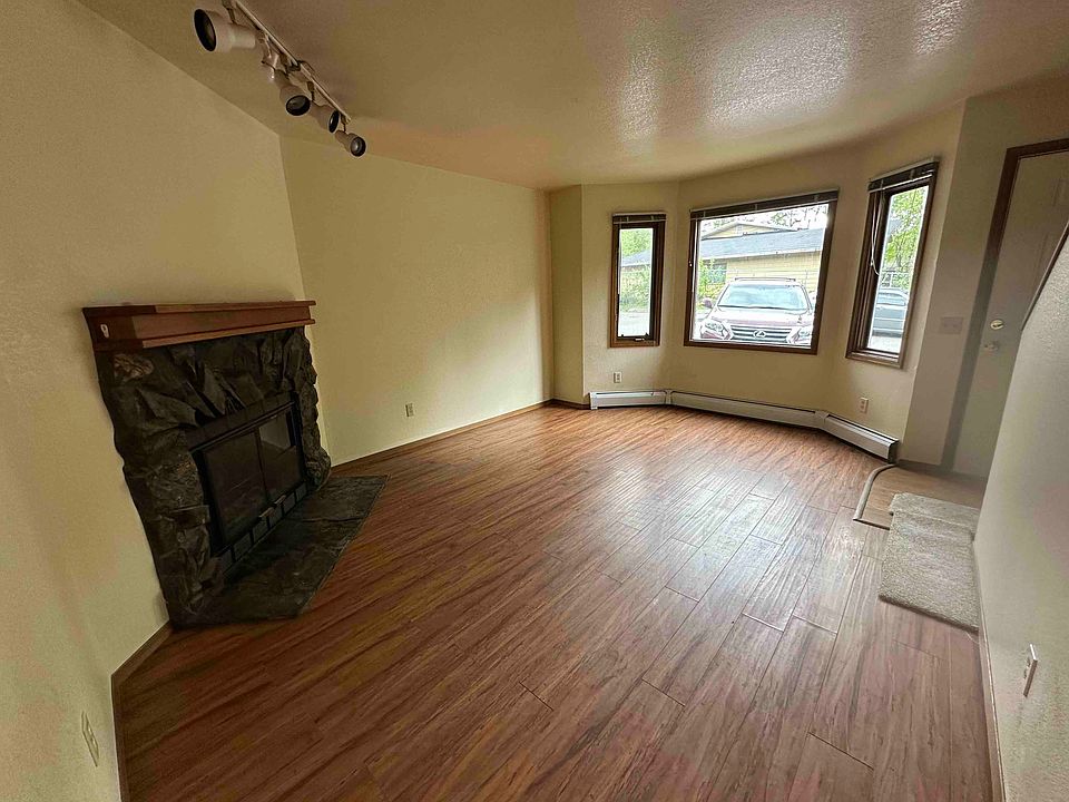 Family room with wood burning fire place