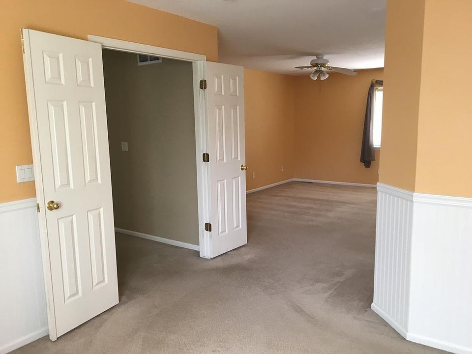 View of sitting room through master. Closet on left.