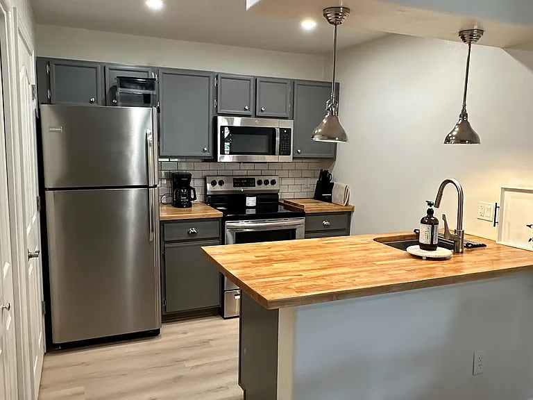 KITCHEN - Refrigerator, oven/stove, dishwasher, microwave, walk-in pantry