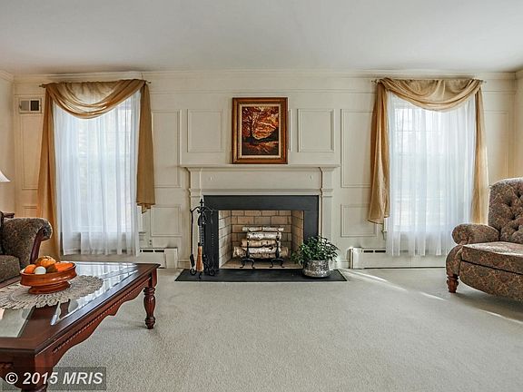 Elegant living room with wood-burning fireplace