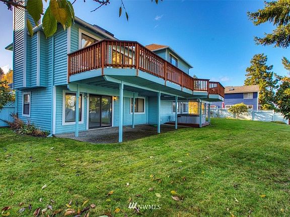 Large backyard w/ multiple access points & fully fenced.