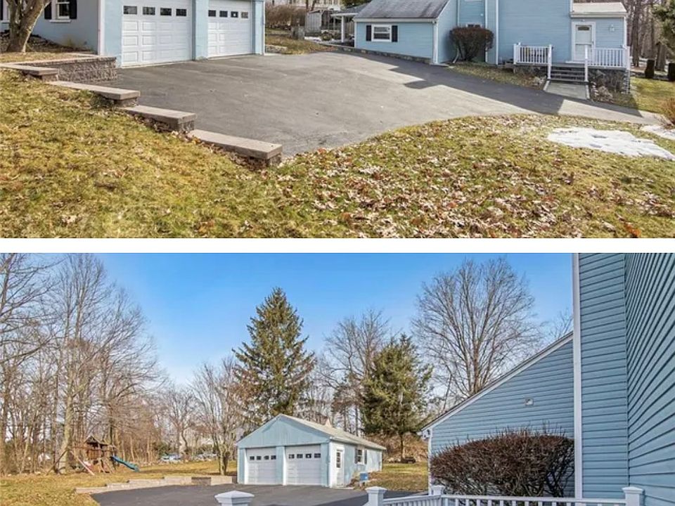 Detached 2-car oversized, garage 
Main entrance to home with porch