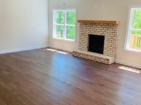 Hardwood Floors throughout the Downstairs Living Areas