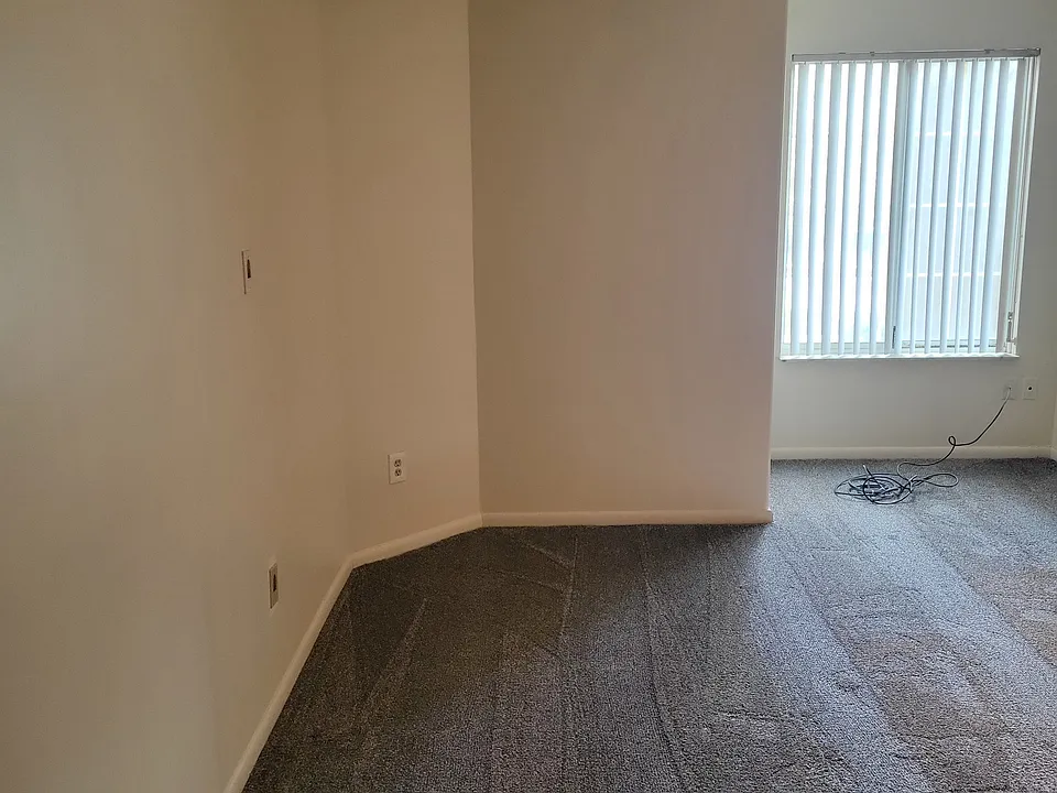 Large bedroom freshly painted.
