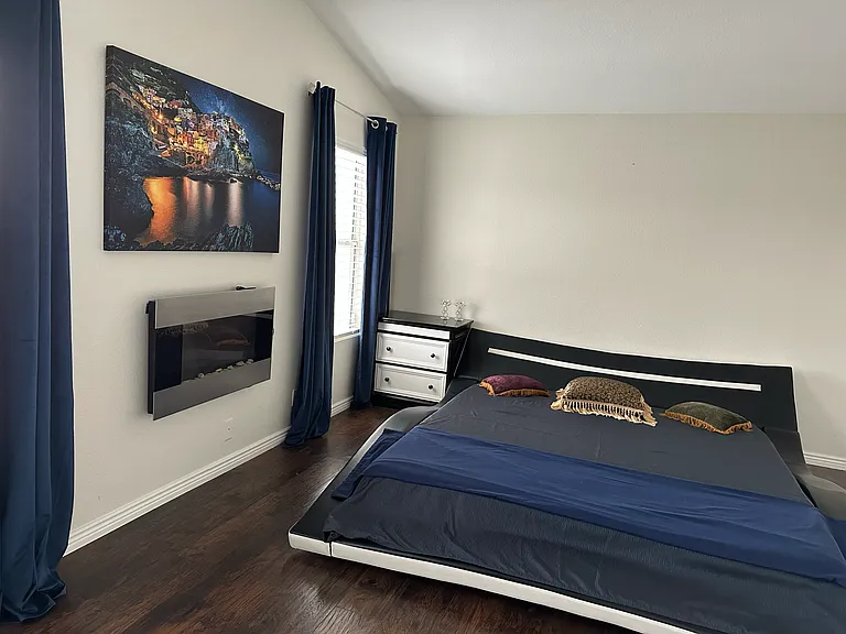 Bright and spacious primary bedroom on the second floor.