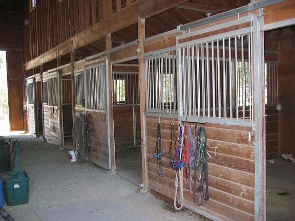 Interior of barn stalls shown