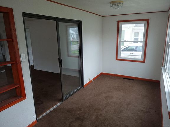 ENCLOSED FRONT PORCH