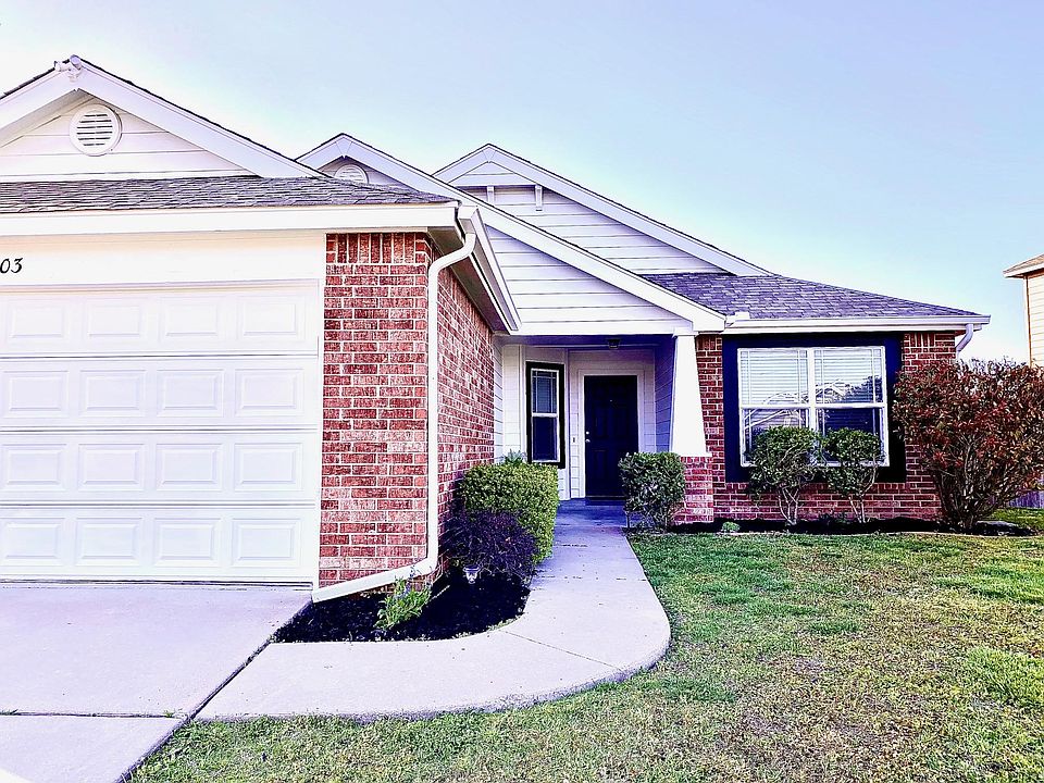 Freshly painted exterior and new garage door opener