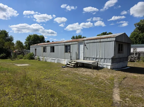 7076 S Surf Ct, Rothbury, MI 49452