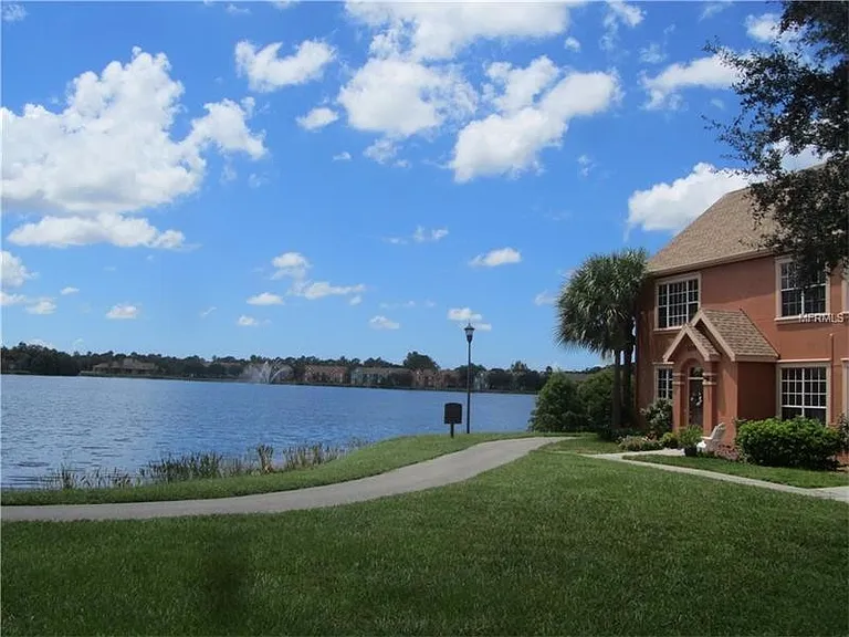9020 Lake Chase Island Way — Photo 1
