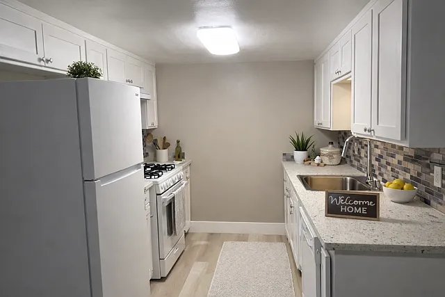Newly remodeled kitchen with beautiful granite counter top.