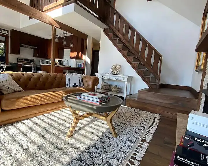 Living Room #1 and Stairwell to Primary Bedroom