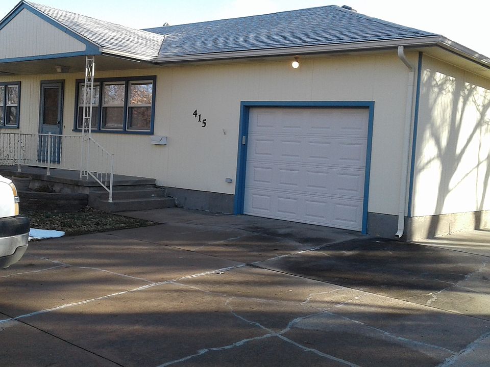 Front door, porch, & Garage