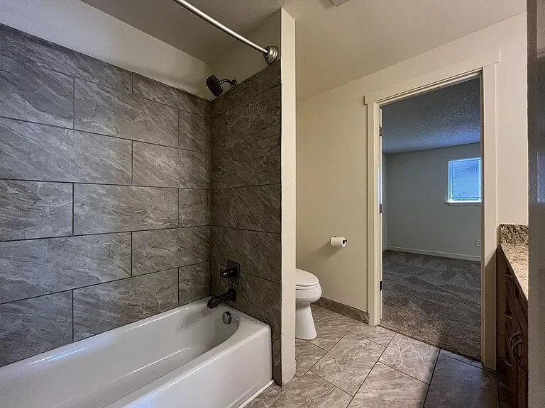 Bright and Airy Home with Stainless Steel Kitchen, Vaulted Ceilings & Washer + Dryer — Photo 36