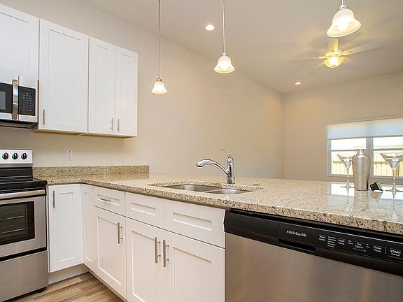 Open floor plan, high ceilings