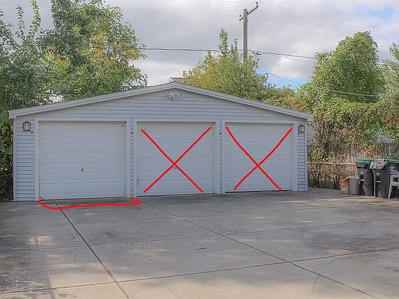 Seperate single car garage on far left