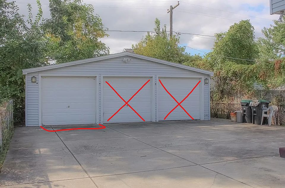 Seperate single car garage on far left