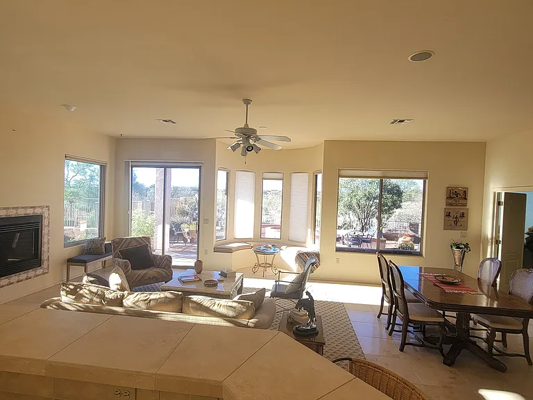 Oversee all the activity from the kitchen, all the while seeing backyard and arroyo. Eat in kitchen area to the left with another large window.