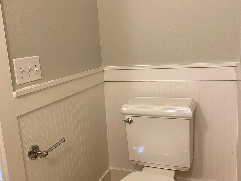 Downstairs, 1/2 bath.
