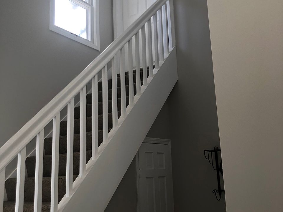 Staircase to the upper 2 bedroom unit.