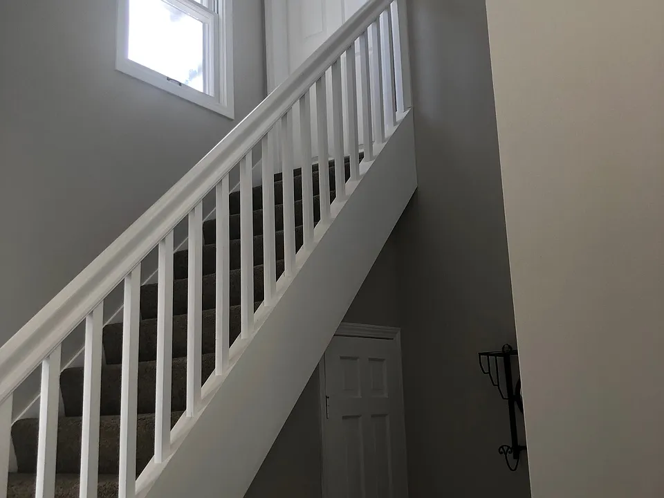 Staircase to the upper 2 bedroom unit.