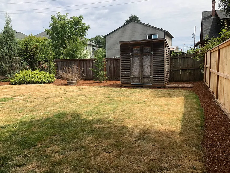 Shed; fenced backyard