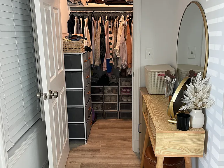 Walk in closet with plenty of storage