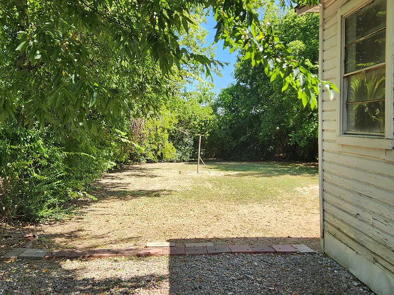 View of backyard from driveway