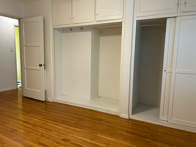 Bedroom has plenty of closet space.